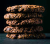 Kakookies stack of soft and delicious dark chocolate cranberry oatmeal cookies