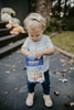 Little kid eating Kakookies blueberry cookie bites